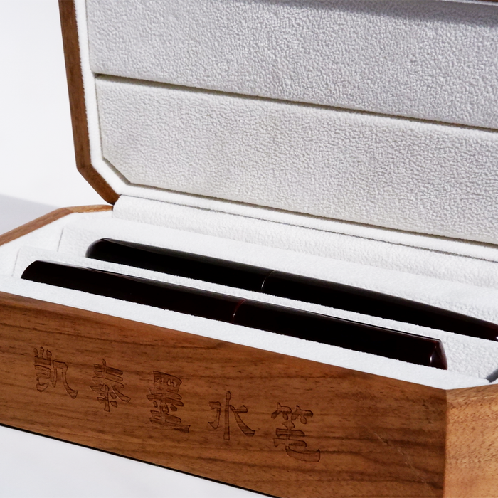 Cathay wooden pen box with a smooth finish, designed to hold and display pens elegantly.