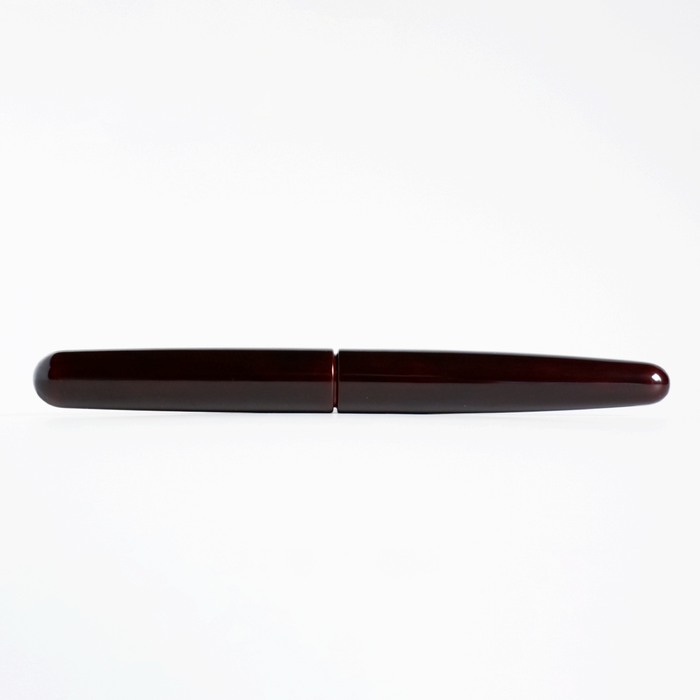 Cathay Cigar Tamenuri Aka fountain pen with a rich, reddish-brown lacquer finish and elegant design.