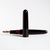 Cathay Cigar Tamenuri Aka fountain pen with a rich, cigar-inspired finish and elegant design, showcasing the premium writing instrument.