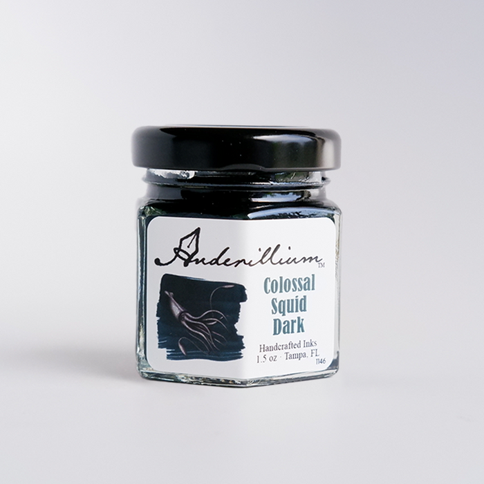 Anderillium Colossal Squid Dark fountain pen ink in a bottle with deep, dark ink visible in the glass container.