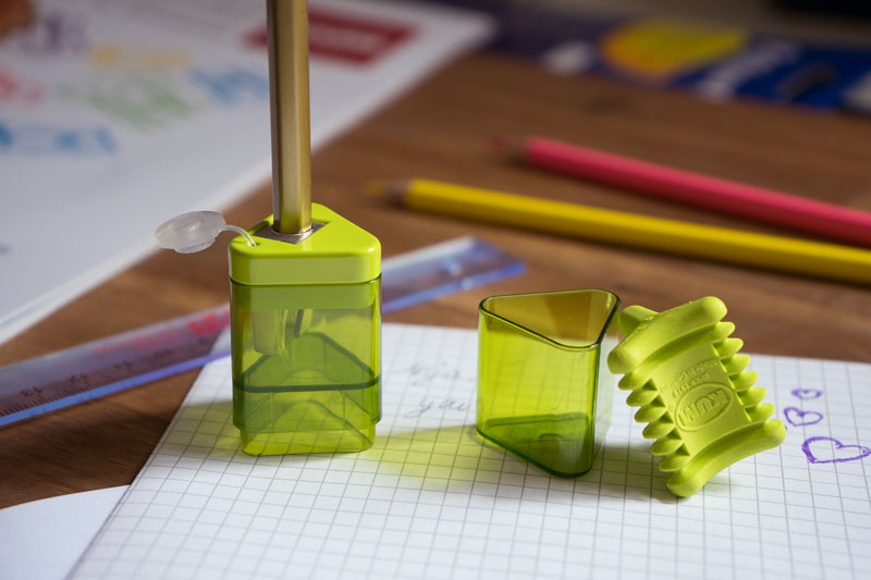 KUM Correc Tri M1 pencil sharpener and eraser combo in a compact design, featuring a built-in eraser and durable sharpening blades.
