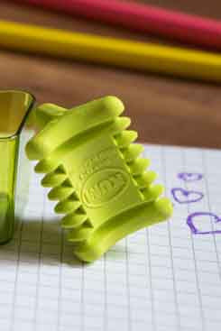 KUM Softi Tri Pop triangle eraser in pastel colors, designed for gentle correction and comfortable grip.