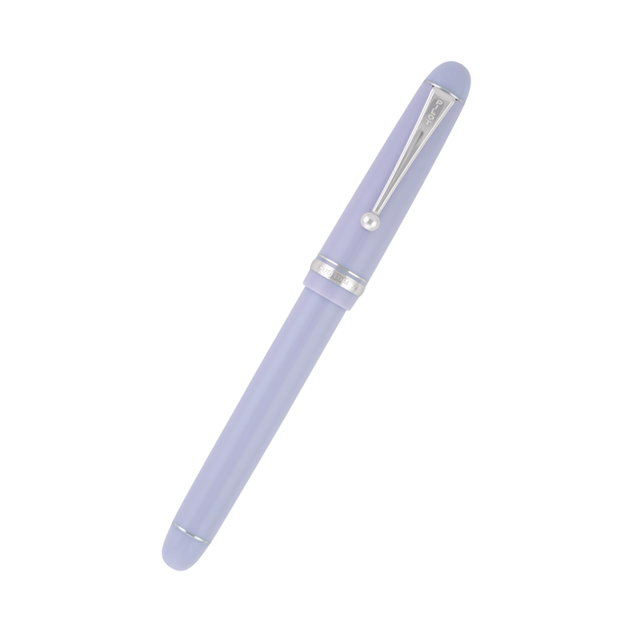 Pilot Custom 74 fountain pen with lavender fog resin body and gold nib, showcasing elegant Japanese craftsmanship.