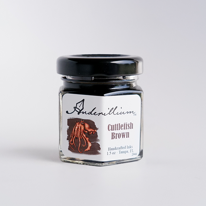 Bottle of Anderillium Cuttlefish Brown fountain pen ink with a label, showcasing rich brown ink suitable for fountain pens.