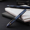 Nahvalur Eclipse fountain pen with cobalt and hepatizon finish, featuring a sleek design and detailed craftsmanship.