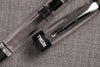 Black Twsbi Diamond 580AL R fountain pen with gold accents and smooth clip, showcasing elegant design and detailed craftsmanship.