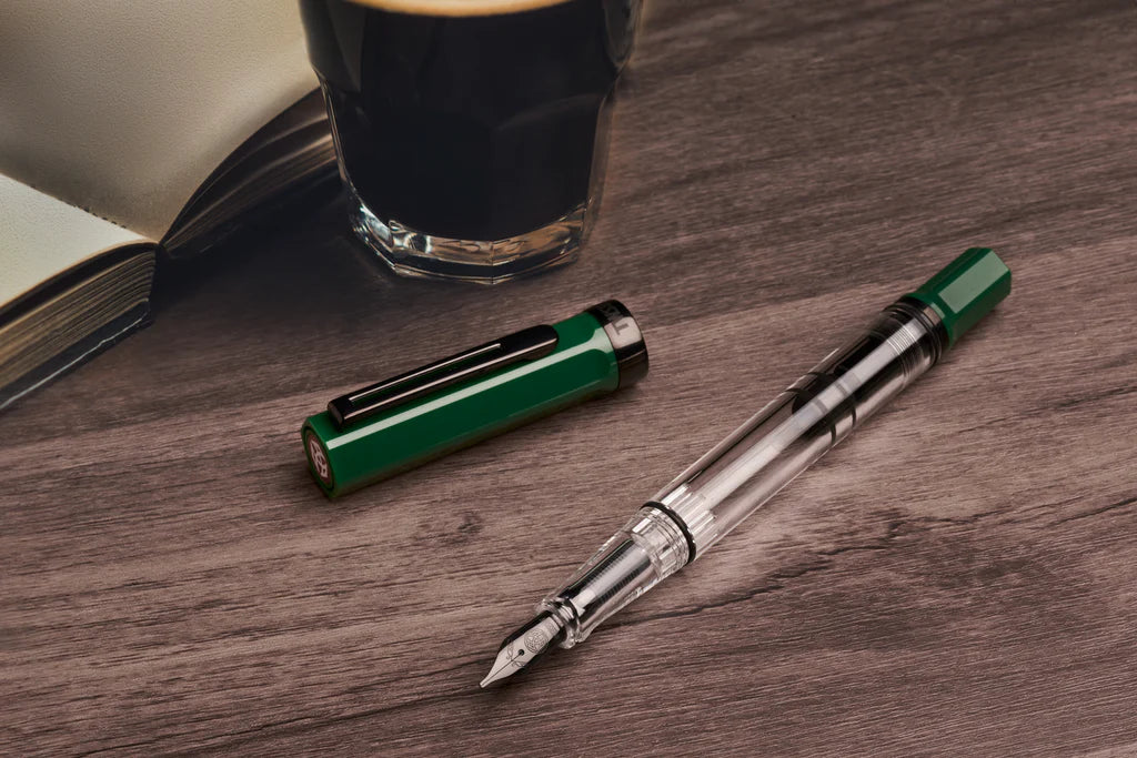 Twsbi Eco Irish Green fountain pen with black onyx accents, featuring a sleek design and smooth ink flow.
