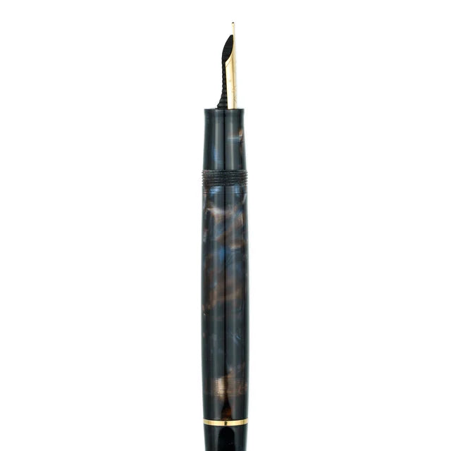 Omas Bologna Galassia gold trim fountain pen with sleek black barrel and elegant gold accents, close-up shot.
