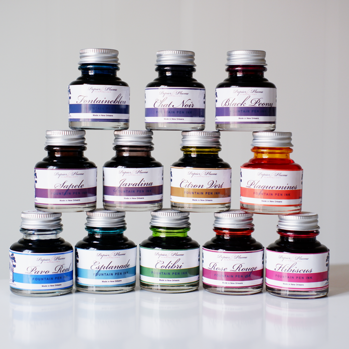 Papier Plume fountain pen ink set of 12 bottles (30ml each) with vibrant colors, ideal for calligraphy and writing enthusiasts.