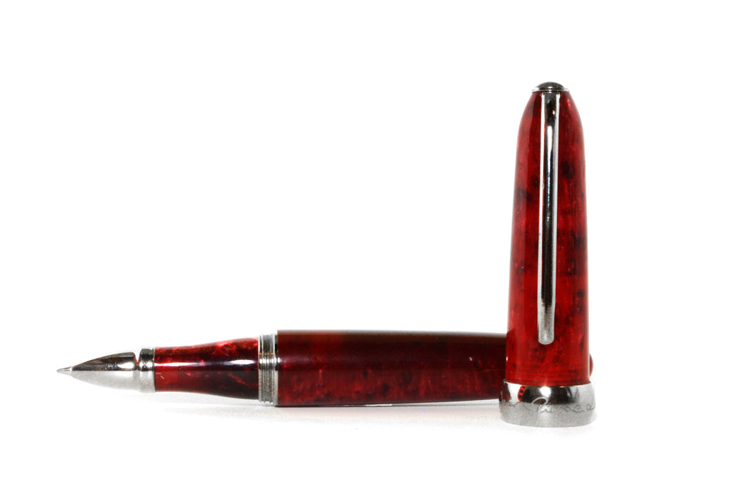Jean-Pierre Lepine Winston rollerball pen with red barrel and chrome accessory, showcasing sleek, elegant writing instrument.