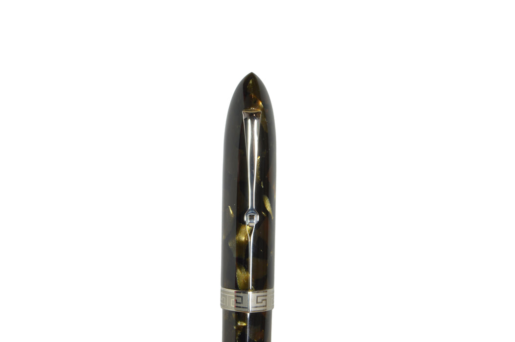 Armando Simoni Club Triangolo green Saft celluloid fountain pen with rhodium accents on a reflective surface.