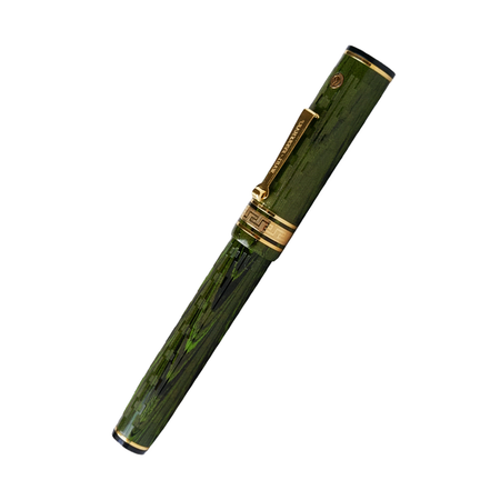 Wahl-Eversharp Decoband green ebonite chased fountain pen with gold trim, showcasing a classic and elegant design.
