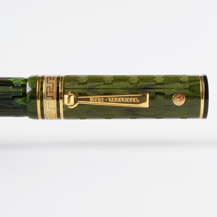 Wahl-Eversharp Decoband green ebonite chased fountain pen with gold trim, showcasing elegant craftsmanship and detailed design.