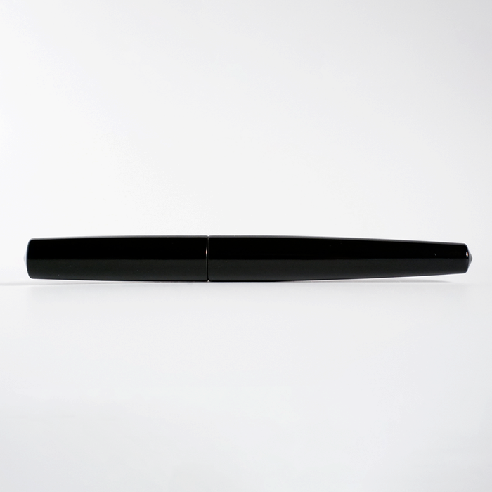 Cathay Monolith Tamenuri fountain pen with a sleek, polished finish and elegant design, featuring a gold nib and smooth grip.