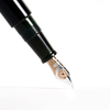 Cathay Monolith Tamenuri fountain pen with a sleek design and Tamenuri finish, featuring a gold nib and elegant craftsmanship.