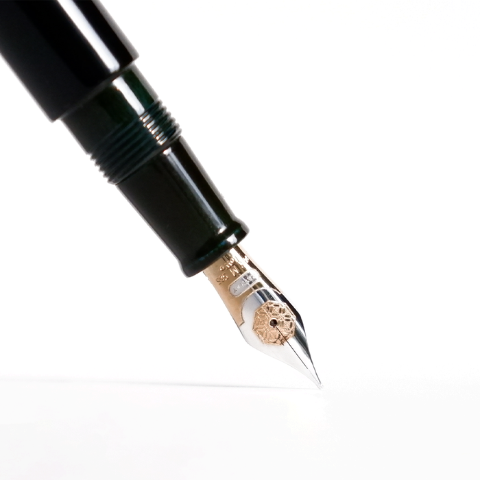 Cathay Monolith Tamenuri fountain pen with a sleek design and Tamenuri finish, featuring a gold nib and elegant craftsmanship.