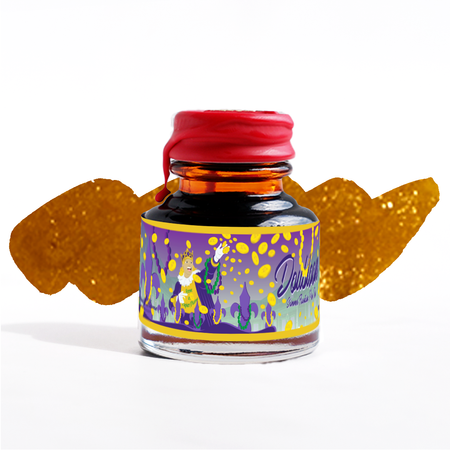Papier Plume Doubloon shimmer fountain pen ink bottle with gold and blue accents, showcasing elegant ink packaging.