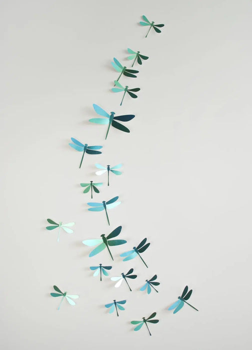 Glossy Caribbean green paper dragonfly craft from Assembli's Paper Dragonfly Collection, showcasing detailed wings and vibrant color.