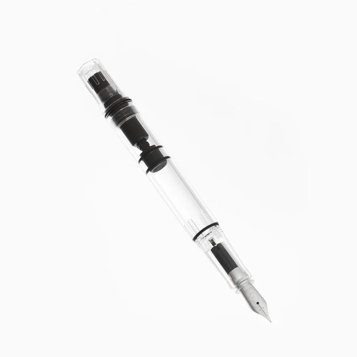 Twsbi Eco-T Clear fountain pen with transparent body and silver accents, showcasing the nib and ink chamber.