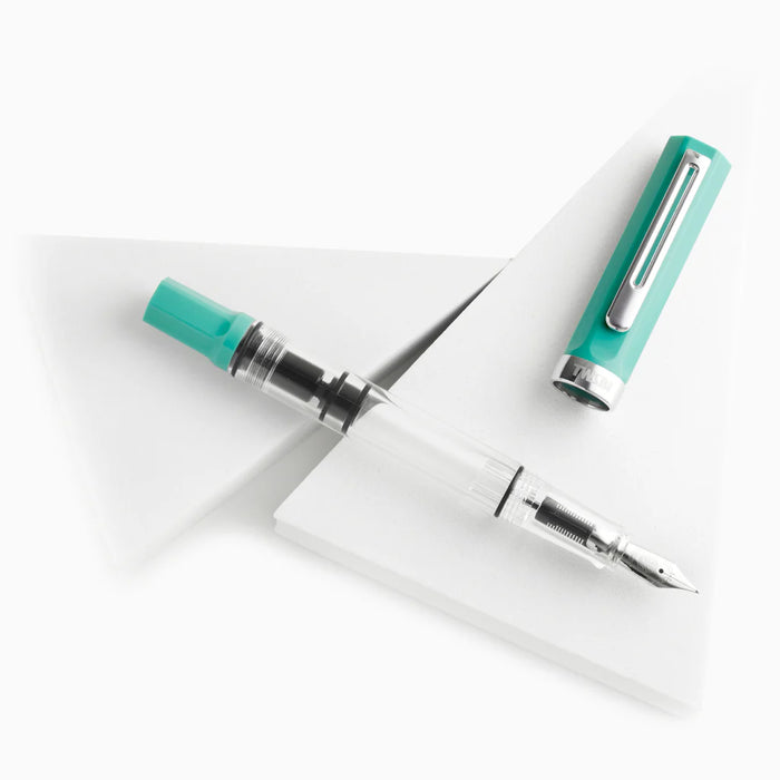 Twsbi Eco Persian Green fountain pen with green resin body and silver accents, showcasing its elegant design and smooth ink flow.