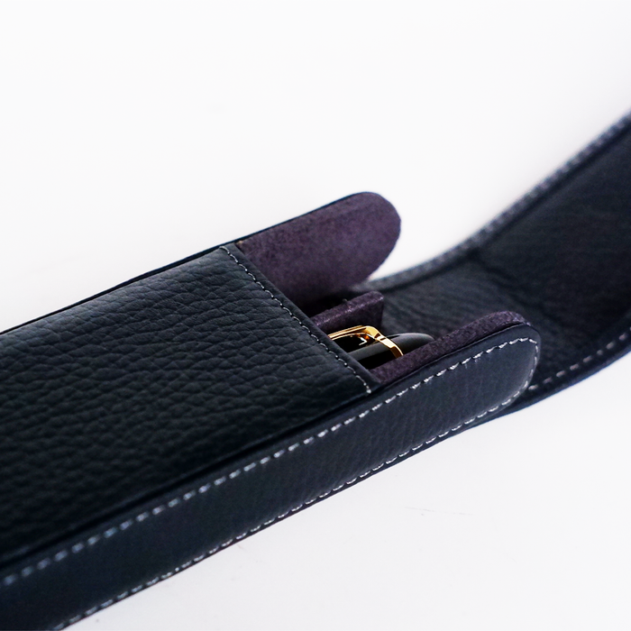 Navy leather pen case by Eng Leather Co. with two compartments for storing pens and writing instruments.
