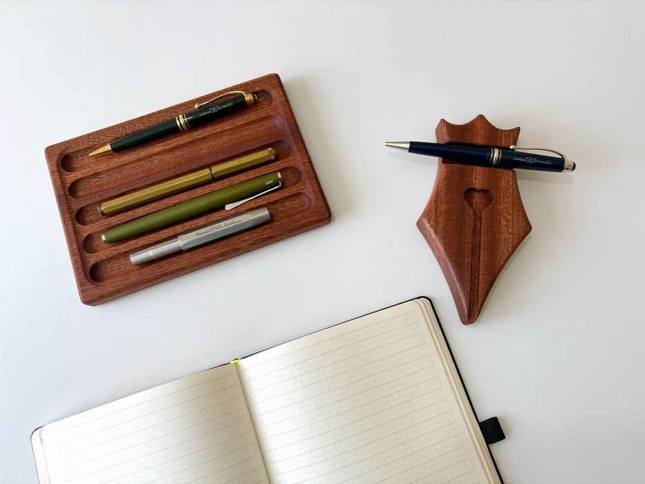 Eng Leather Co. wooden pen tray with multiple compartments for organizing pens and stationery on a desk.
