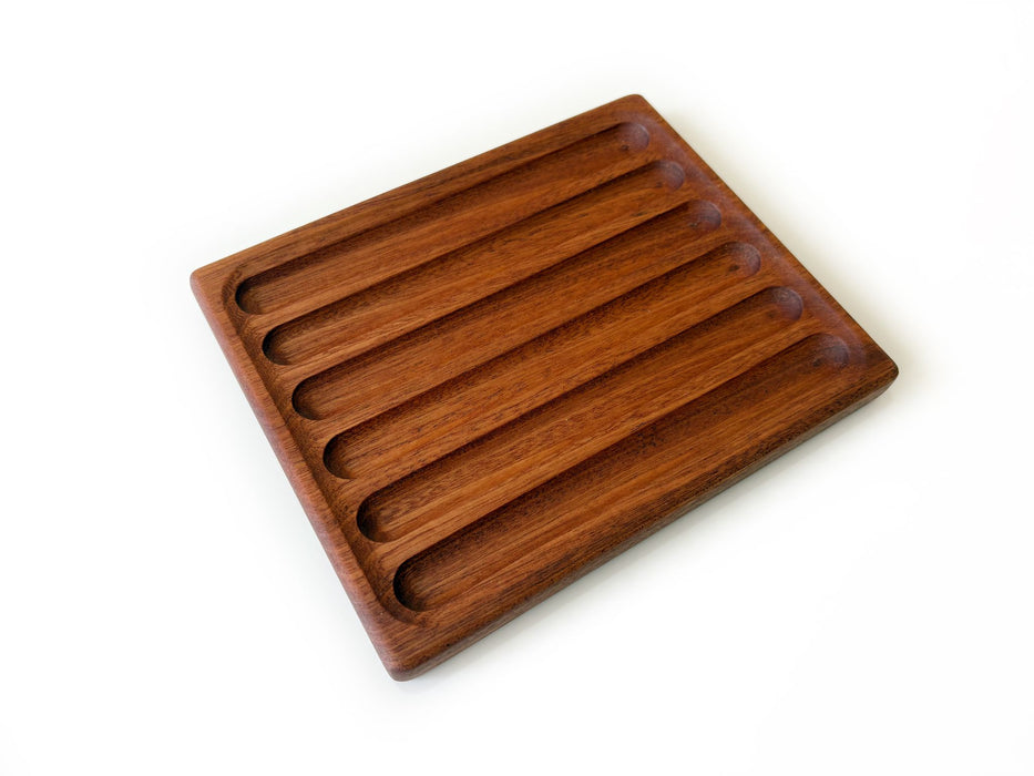 Eng Leather Co. wooden pen box with a sleek design, featuring a compartment for pens and small accessories.