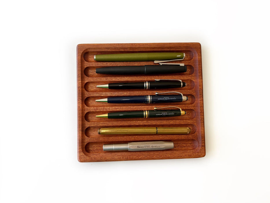 Eng Leather Co. wooden pen tray with compartments for organizing pens and stationery in a sleek, elegant design.