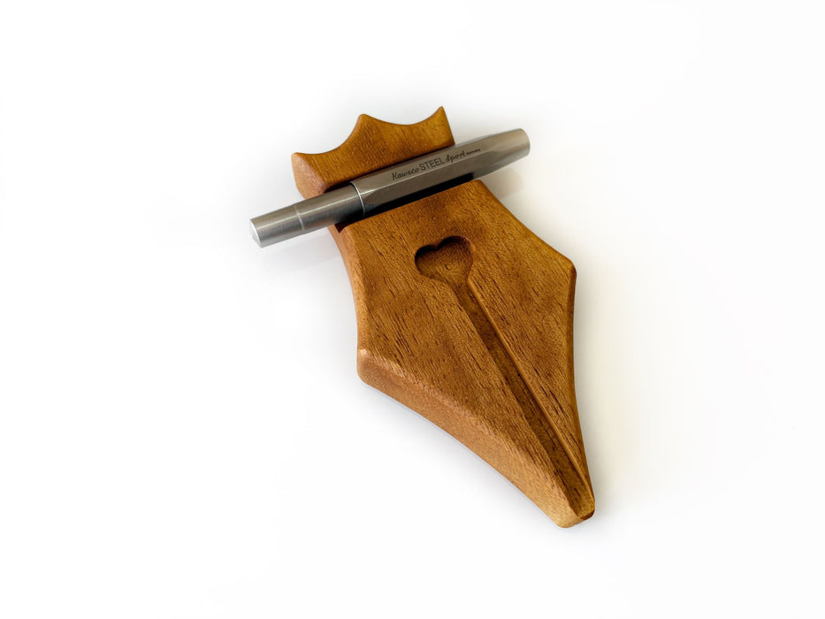 Eng Leather Co. wooden pen rest with a sleek design, featuring a smooth surface and a slot for holding a pen securely.