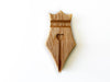 Eng Leather Co. wooden pen rest with a sleek design, featuring a slot for holding a pen on smooth oak wood surface.