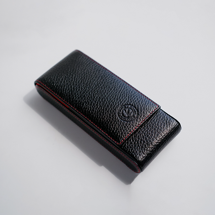Black leather pen case by Eng Leather Co. with three compartments, designed for stylish and organized pen storage.