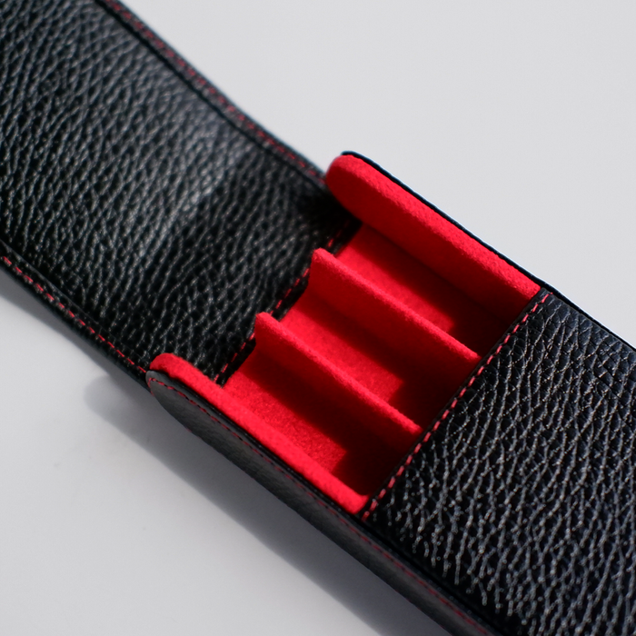 Black leather pen case by Eng Leather Co. with three compartments, designed for stylish, organized storage of writing instruments.