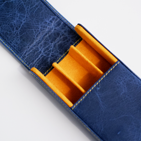 Blue leather pen case by Eng Leather Co. with three slots for pens, featuring a sleek, compact design.