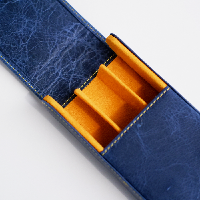 Blue leather pen case by Eng Leather Co. with three slots for pens, featuring a sleek, compact design.