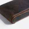 Dark brown Eng Leather Co. 3-pen hard case with leather exterior and secure snap closure, designed for stylish pen storage.