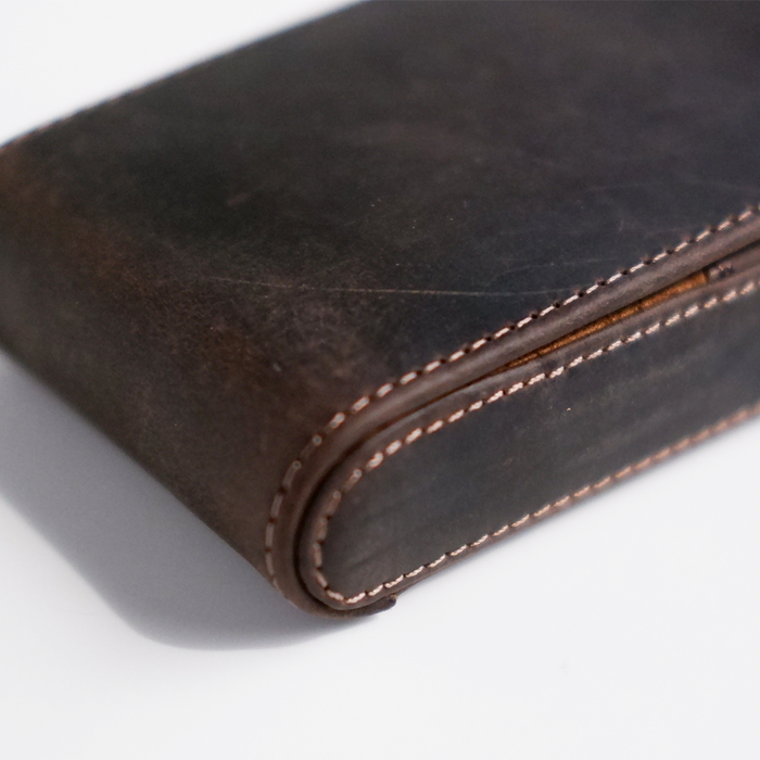 Dark brown Eng Leather Co. 3-pen hard case with leather exterior and secure snap closure, designed for stylish pen storage.