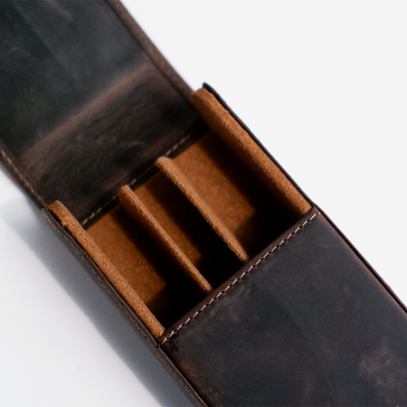 Dark brown Eng Leather Co. 3-pen hard case with sleek leather design, perfect for organizing and protecting writing instruments.