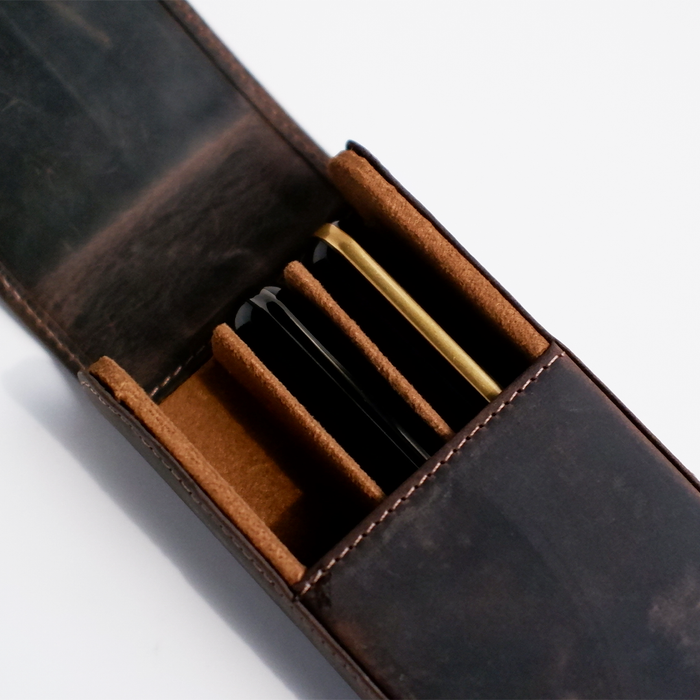 Dark brown leather pen case by Eng Leather Co. with a 3-pen capacity, featuring a sleek, durable design for stylish organization.