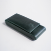 Green leather pen case by Eng Leather Co. with three compartments, designed to securely hold and organize pens.