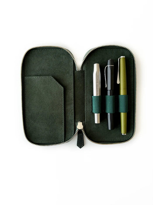 Eng Leather Co. 3-slot leather pen case in Aurora Light green, holding three pens, showcasing a sleek and stylish design.