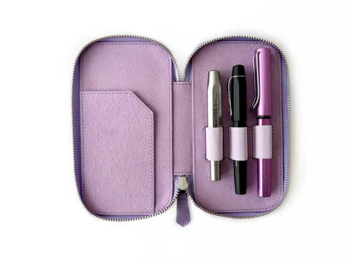 Light lavender leather pen case with three slots from Eng Leather Co., designed for elegant organization of writing instruments.