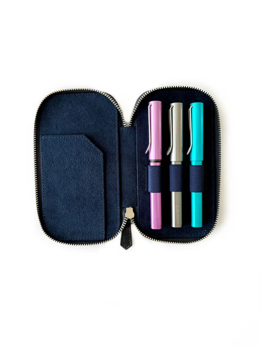 Dark Cloud leather pen case by Eng Leather Co. with three slots, featuring a sleek, dark blue finish and smooth leather texture.
