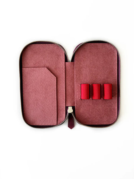 Eng Leather Co. burgundy leather 3-slot pen case with soft texture, designed to hold and organize writing instruments.