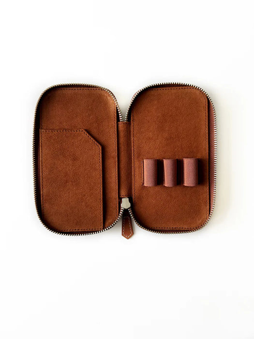 Eng Leather Co. 3-slot leather pen case in rich toffee color, showcasing its smooth leather texture and compact design.