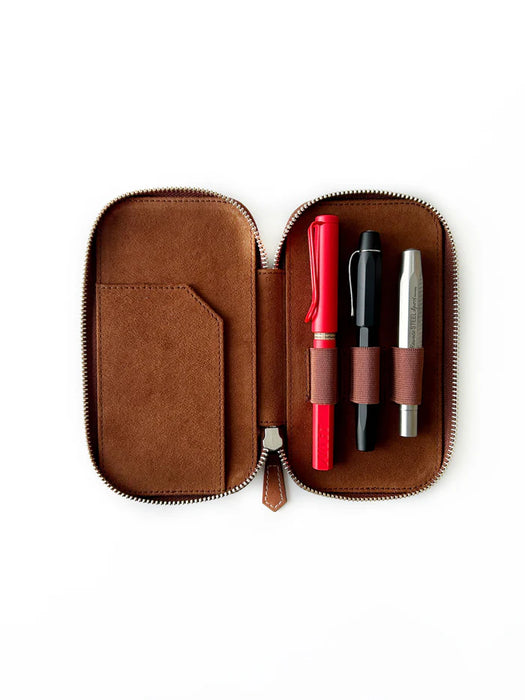 Eng Leather Co. 3-slot leather pen case in rich toffee color with smooth leather finish, designed for storing pens and writing instruments.