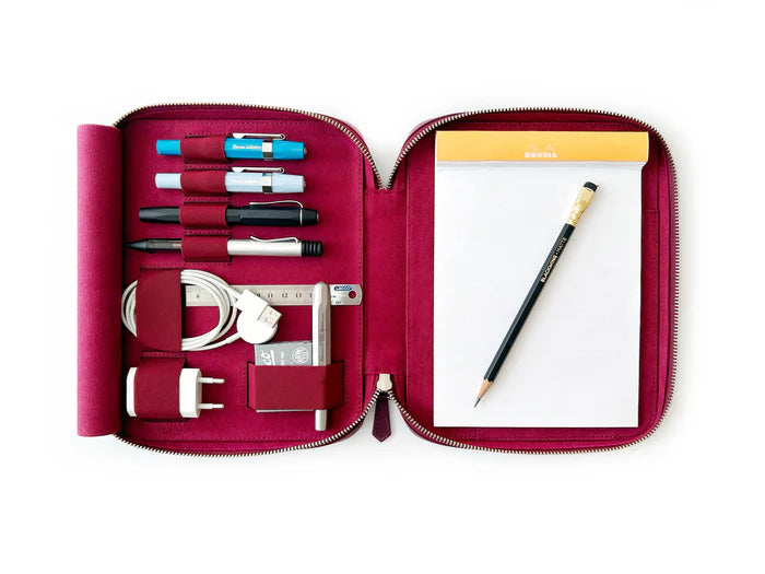 Dark black violet Eng Leather Co. 4-slot A5 organizer leather pen case with sleek design and secure slots for pens.