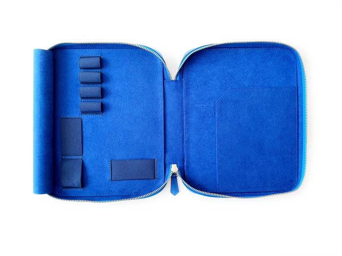 Eng Leather Co. Prussian Blue leather pen case with four slots for A5-sized pens and accessories.