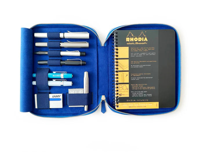 Eng Leather Co. Prussian Blue leather pen case with four slots for A5-sized pens and accessories.