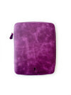 Violet leather pen case with four slots for A5-sized pens from Eng Leather Co. on smooth leather surface.