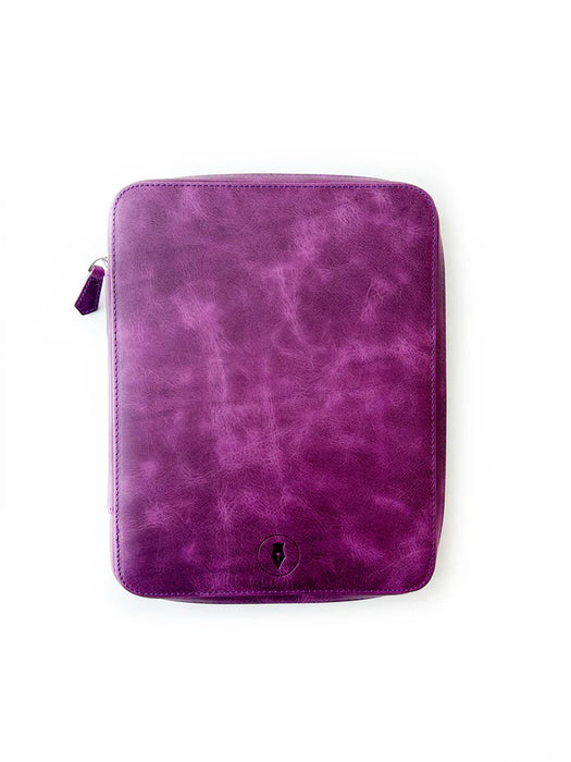 Violet leather pen case with four slots for A5-sized pens from Eng Leather Co. on smooth leather surface.